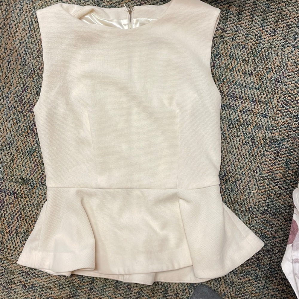 White peplum top